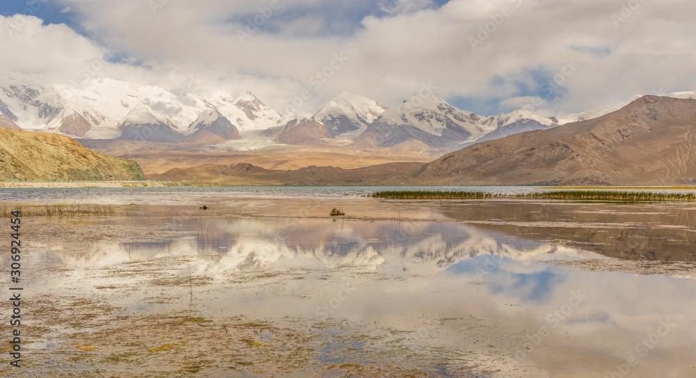Tashkurgan, China - located 3.500m above the sea level, along the road between Kashgar and Tashkurgan, the Kala Kule Lake offers some amazing sights and colors 