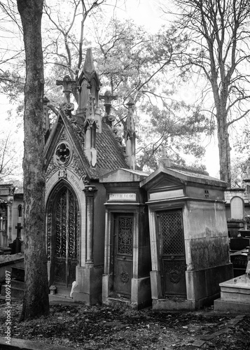 Paris, France - November 18, 2019: Graves and crypts in Pere Lachaise Cemetery, This cemetery is the final resting place for many famous people