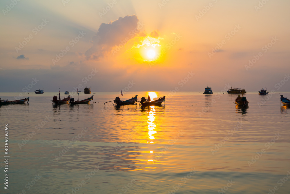 Sunset on a beach with boats, Ko Tao,Thailand