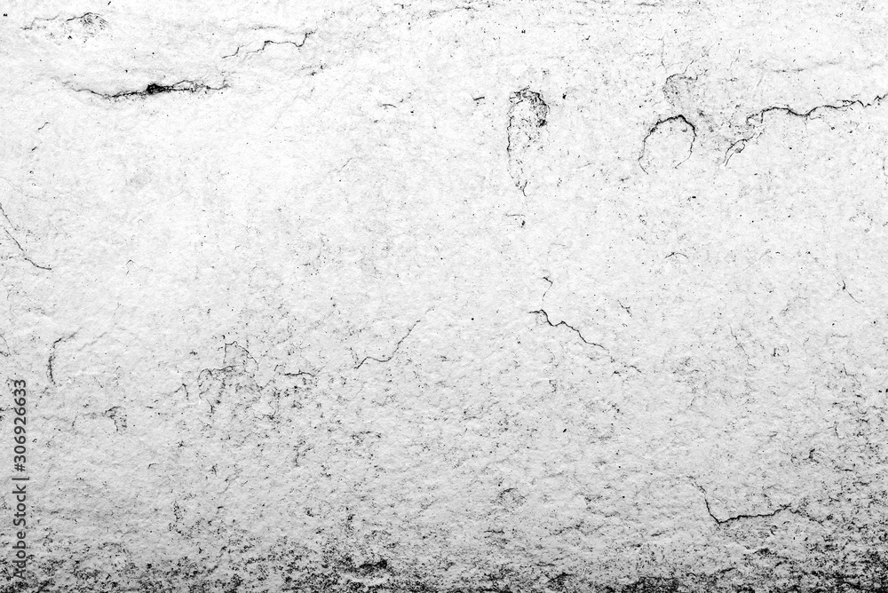 Texture of a concrete wall with cracks and scratches which can be used as a background Texture of a concrete wall with cracks and scratches which can be used as a background