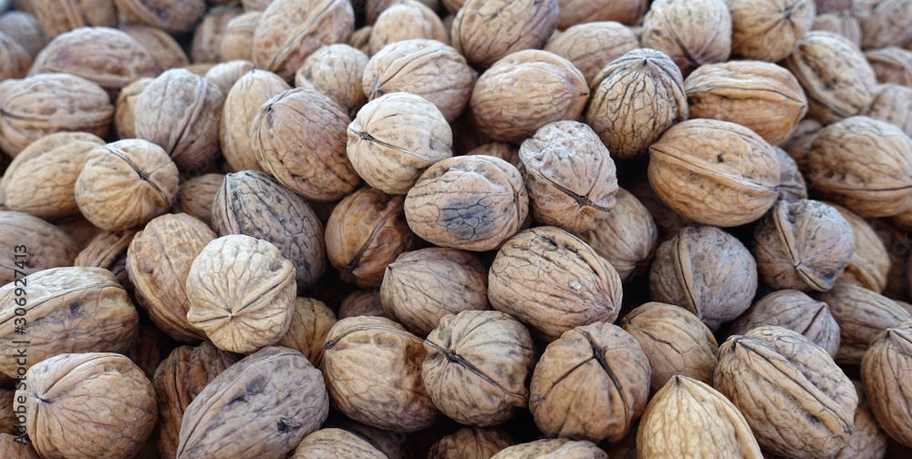 closeup of walnuts on display at the market closeup of walnuts on display at the market