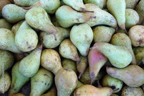 close up of pears on display at the market