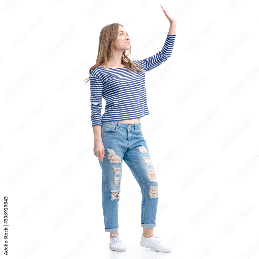 Woman in jeans and vest smile standing waving hand on white background isolation Woman in jeans and vest smile standing waving hand on white background isolation