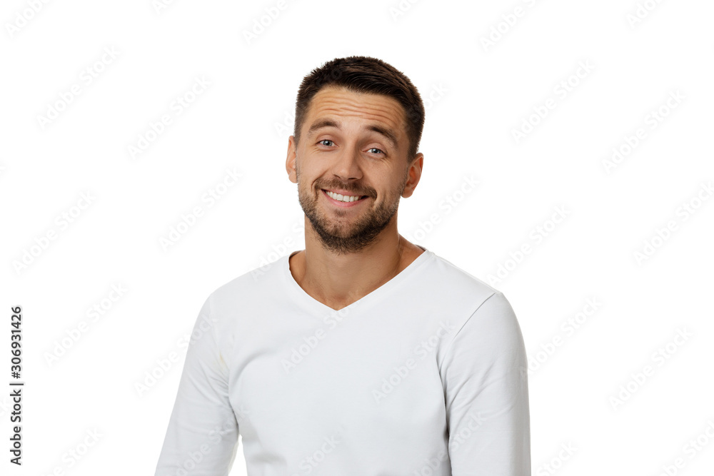 Close-up portrait of smiling handsome bearded man in white shirt looking at camera isolated on white background Close-up portrait of smiling handsome bearded man in white shirt looking at camera isolated on white background