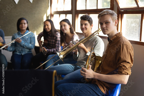 Teenage musicians rehearsing photo