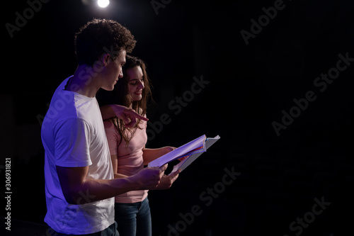 Teenagers rehearsing in a theatre