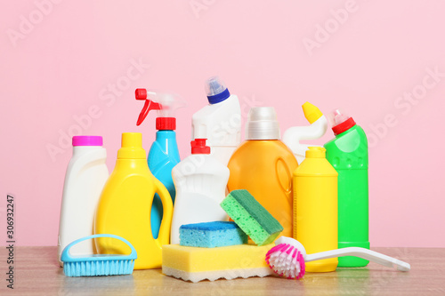 set of cleaning products on the table on a colored background.