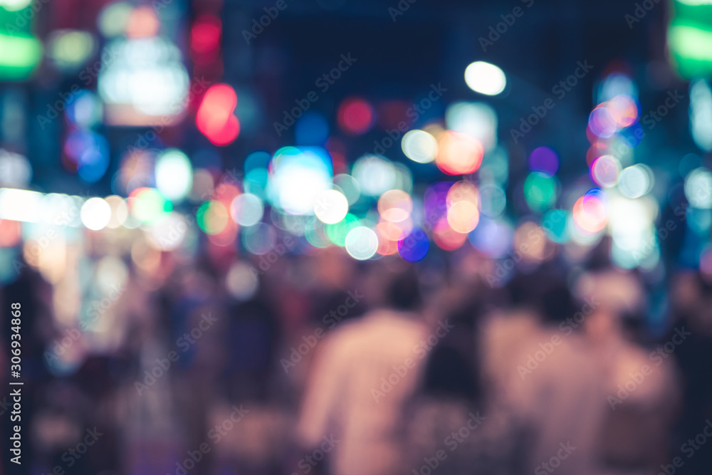 Light blur defocused of bangla road in Patong city, night time with many people walking around to drinking shop and party Light blur defocused of bangla road in Patong city, night time with many people walking around to drinking shop and party