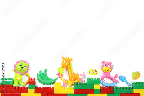 Colored toys  constructor  rattles with space for your text  top view  on white background