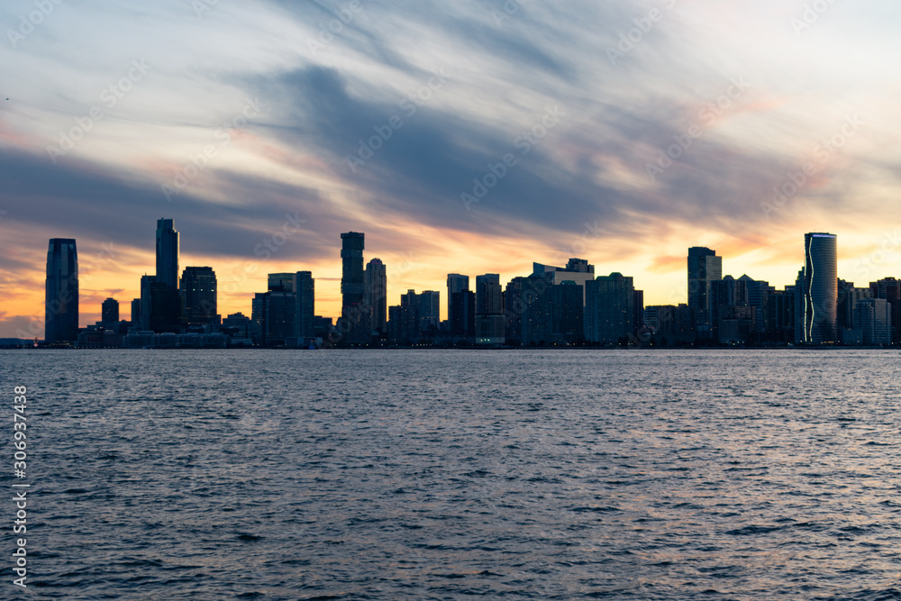 Jersey City Skyline along the Hudson River during a Sunset