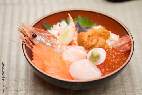 Fresh raw seafood mixed rice bowl (Kaisen-don, Japanese tasty food).