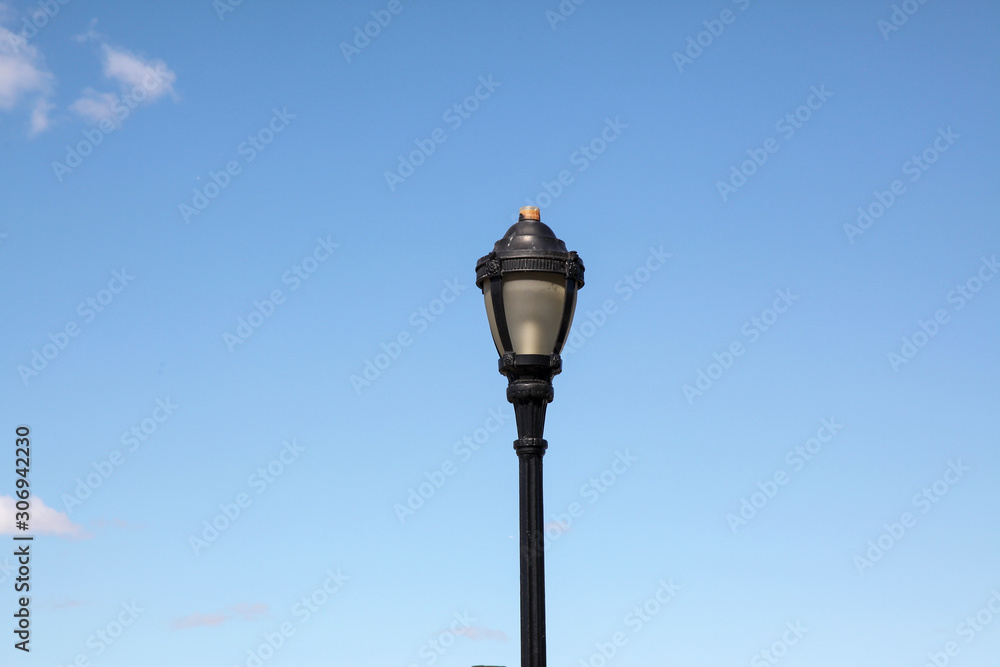 Vintage Light pole in blue sky background