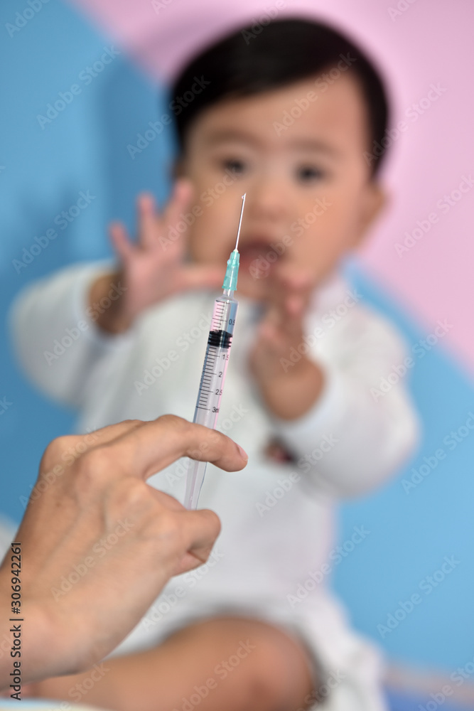 Children are crying and scared.doctors and children who are treated. Children get vaccinated at the hospital. Children are crying and scared.doctors and children who are treated. Children get vaccinated at the hospital.