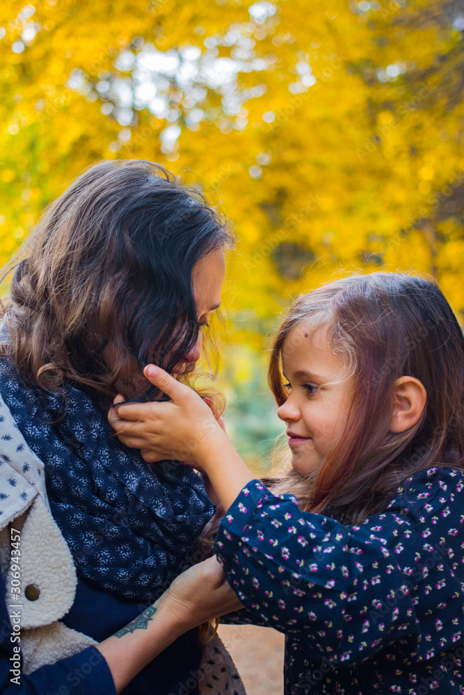 Fototapeta premium Mother and daughter little girl in the forest.