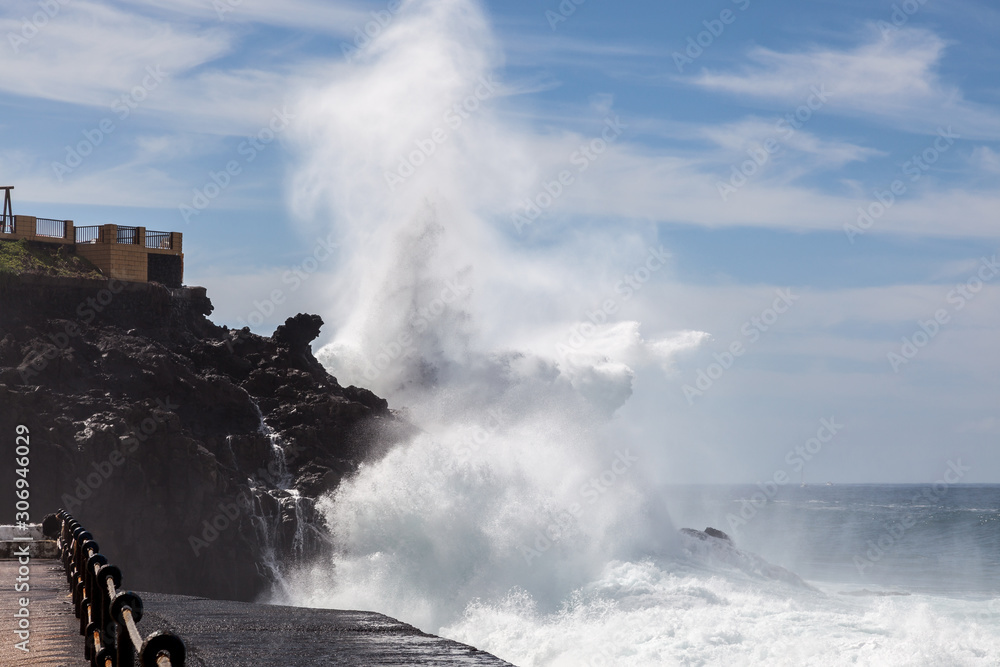 Fototapeta premium Massive wave hitting the rocky shore in Tenerife