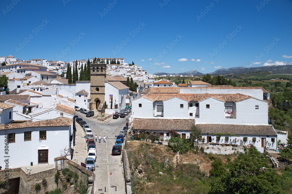 View from Ponte Viejo (the Old Bridge) in Ronda, Spain. This bridge spans the 120-metre-deep (390 ft) chasm that carries the Guadalevín River and divides the city of Ronda
