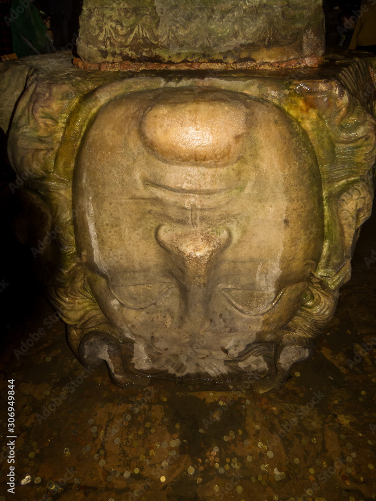 Istanbul, Turkey - October 30, 2019: View of the Medusa Head in the Basilica Cistern.