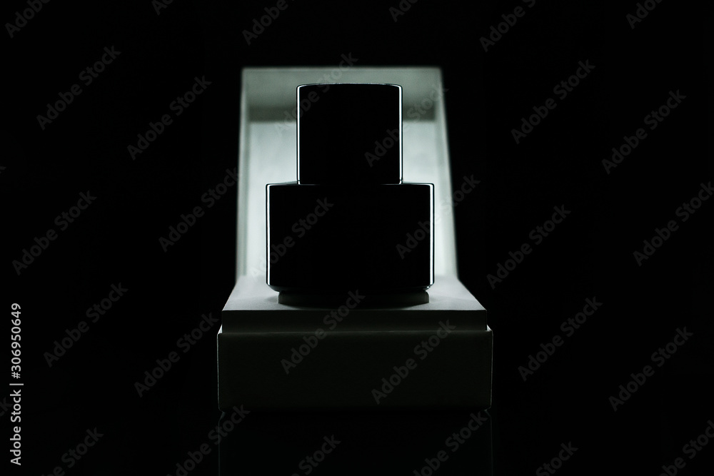 bottle of perfume on black background bottle of perfume on black background