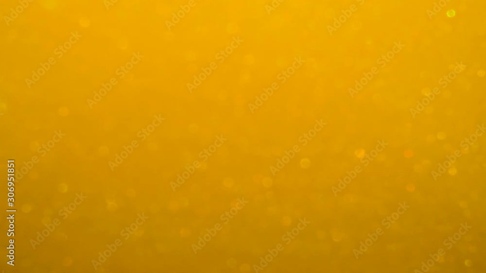 Golden Wave Background. Art Gold Background. Golden Sand , Dust Creating Abstract Cloud Formations. Slow Motion. Gold Texture. Amazing Metamorphosis Sparkle Shiny Particles Defocused Blur Bokeh Golden Wave Background. Art Gold Background. Golden Sand , Dust Creating Abstract Cloud Formations. Slow Motion. Gold Texture. Amazing Metamorphosis Sparkle Shiny Particles Defocused Blur Bokeh