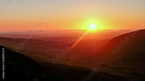 Time lapse of sun rising in the Ogwen Valley, Snowdonia Wales, UK