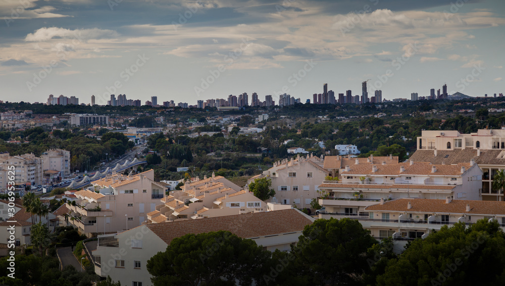 Editorial ALTEA, SPAIN - NOVEMBER 23, 2019: A view over the rooftops from Altea and the skyline buildings of Benidorm on the Costa Blanca, Spain