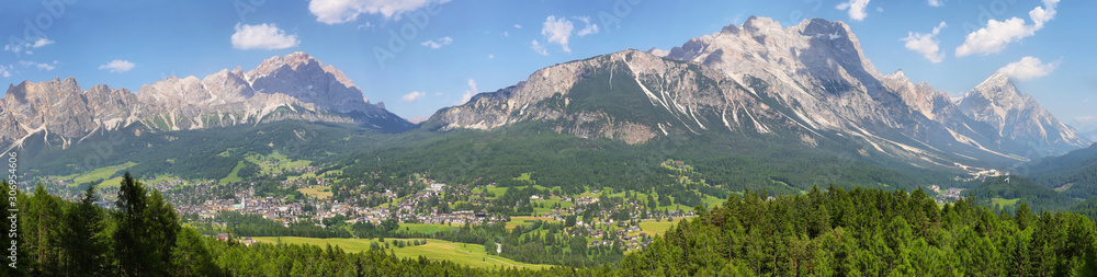 Cortina d'Ampezzo town panoramic view with alpine green landscape, South Tyrol, Italy.
