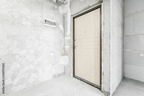 interior of the apartment without decoration in gray colors