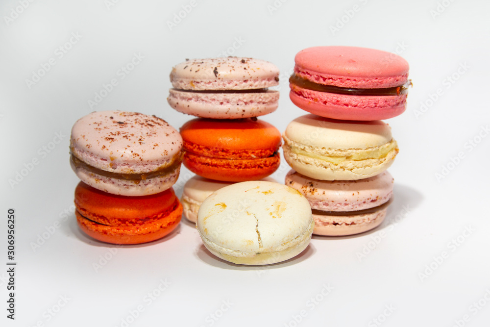 Fototapeta premium Colorful macaroni cakes on white background. Dessert