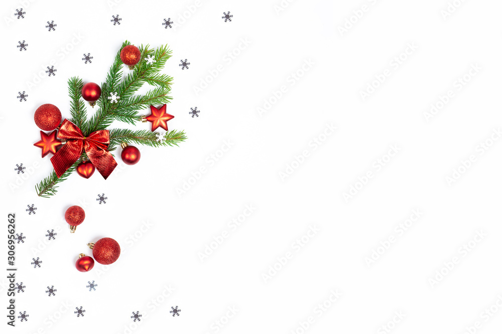 Christmas flatlay copyspace. Red Christmas toys and sprigs of spruce on a white isolated background. Holiday card, copy space. Design elements. Christmas frame. Christmas flatlay copyspace. Red Christmas toys and sprigs of spruce on a white isolated background. Holiday card, copy space. Design elements. Christmas frame.