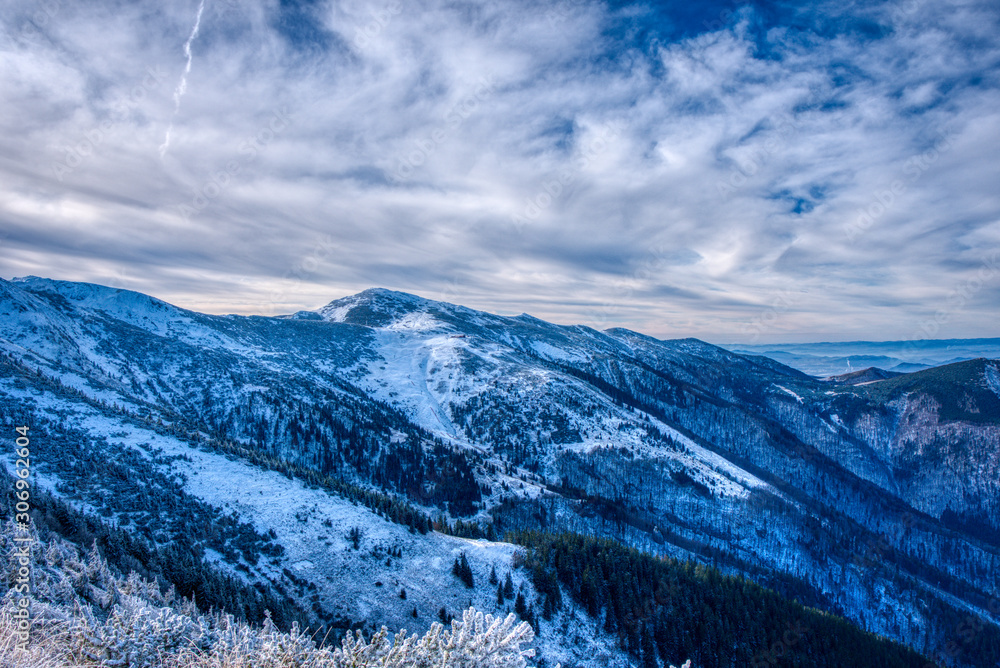 beautifully snowy mountains with clouds, slovakia Mala Fatra