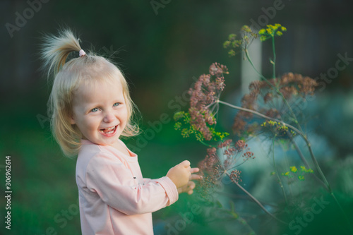 Happy Little Girl Laugh Plant Background Outdoors