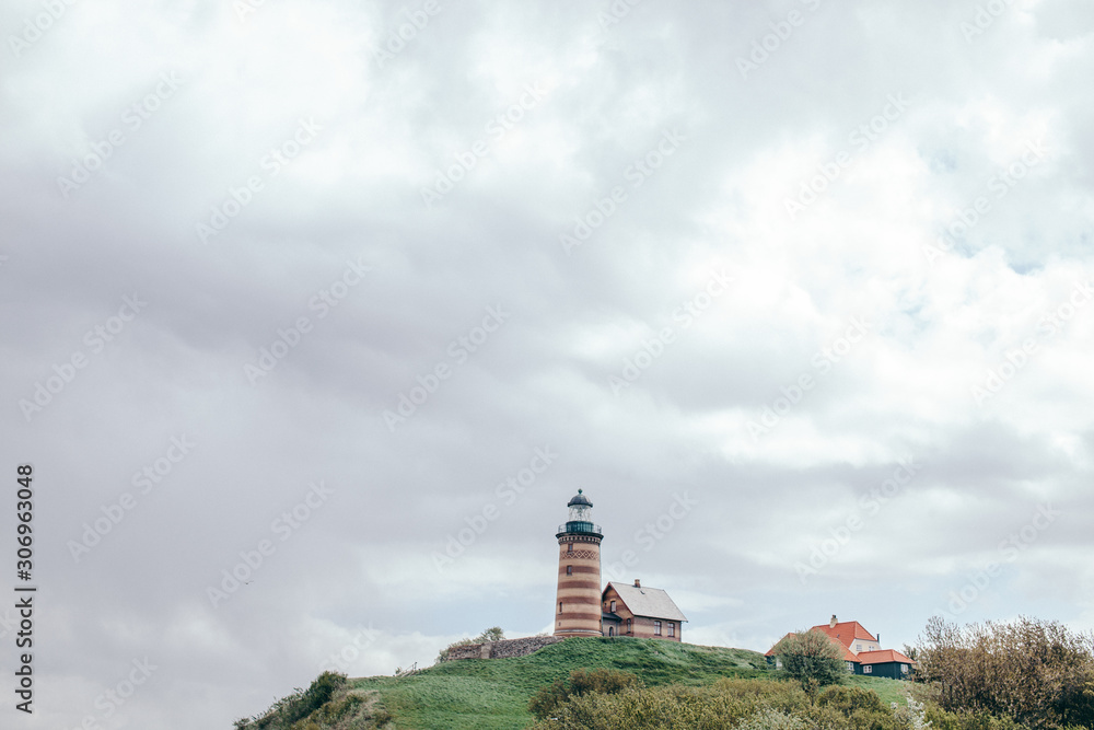 Old lighthouse on a hill in Denmark
