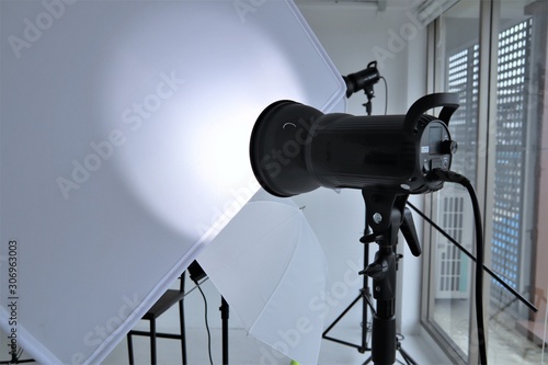 Photography equipment lighting system camera portrait professional studio set up position with white background 