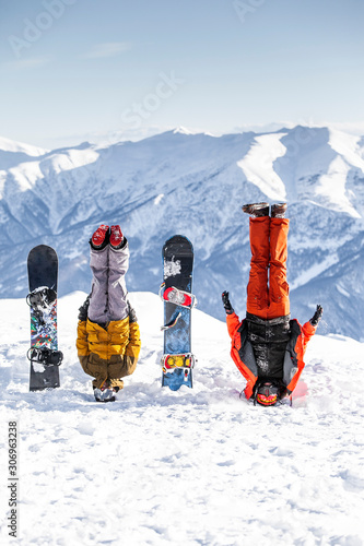 Snowboard yoga people enjoying winter vacation.