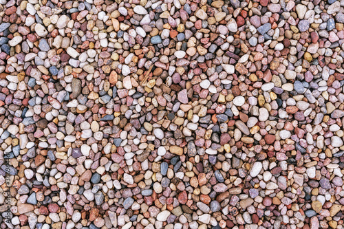 assorted colorful and smooth pebbles from the beach