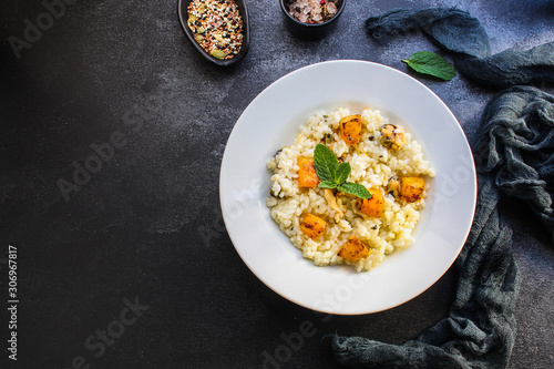 risotto mussels, pumpkin (main course, rice seafood) menu concept. food background. top view. copy space