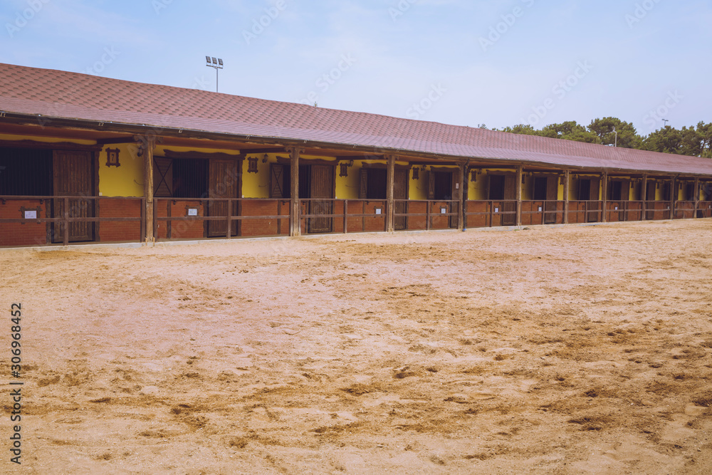 A large arena with sand for horses . Elite Horse and Polo Club . training ground. horse club. Sand Stadium for horseback riding. Horse home . Horse stables . A large arena with sand for horses . Elite Horse and Polo Club . training ground. horse club. Sand Stadium for horseback riding. Horse home . Horse stables .