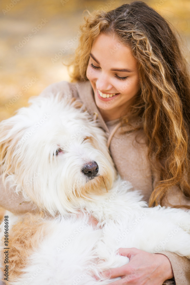 Portrait of a beautiful woman with dog. Portrait of a beautiful woman with dog.