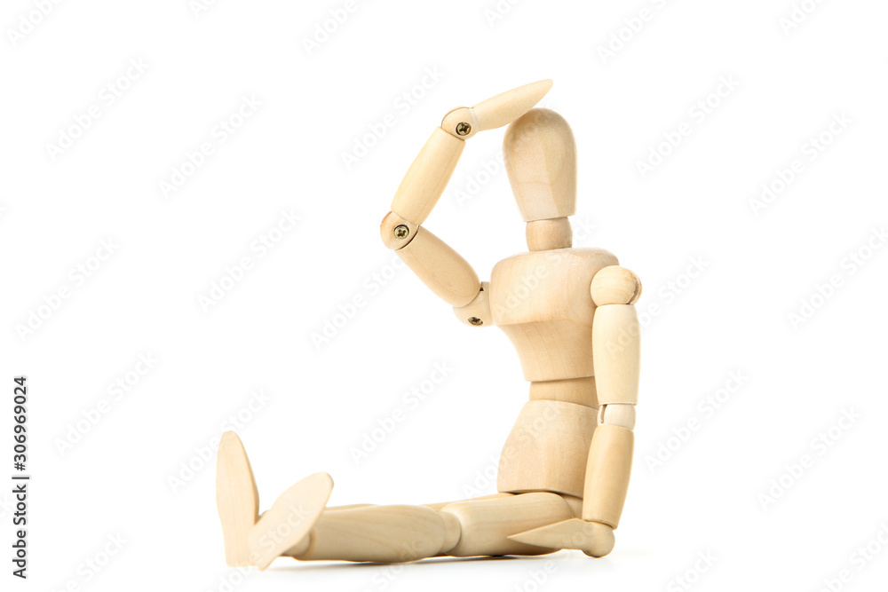 Wooden figure having a headache on white background Wooden figure having a headache on white background