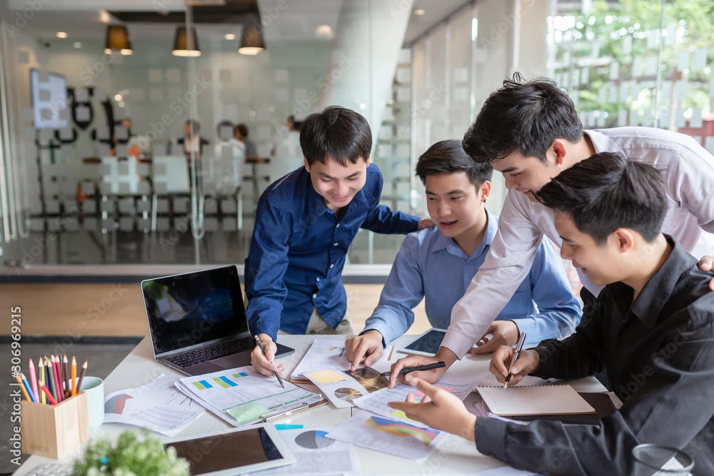 Group of young asian businessman together share opinions and propose new marketing and business ideas at meeting. Group of young asian businessman together share opinions and propose new marketing and business ideas at meeting.