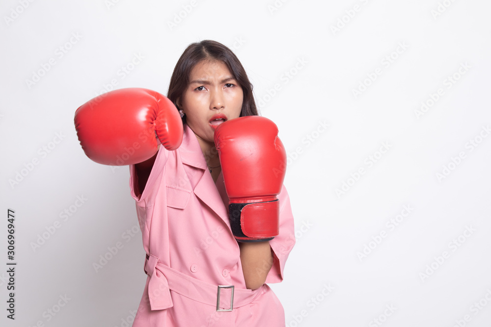 Young Asian woman with red boxing gloves. Young Asian woman with red boxing gloves.