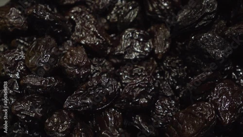 Pile of prunes closeup video in a slow motion.