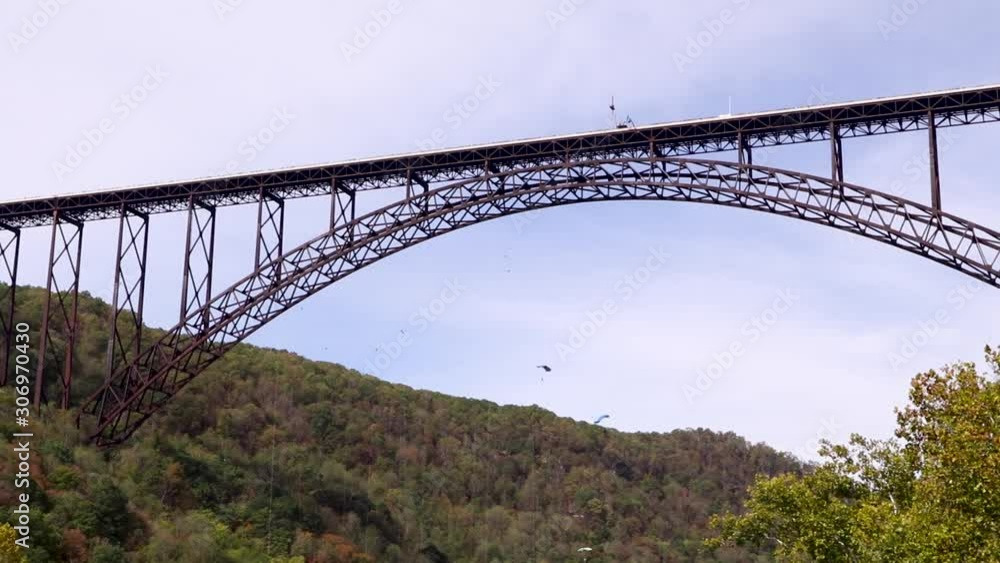 Base jumpers parachuting off New River Gorge Bridge, West Virginia Base jumpers parachuting off New River Gorge Bridge, West Virginia