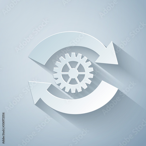 Paper cut Gear and arrows as workflow concept icon isolated on grey background. Gear reload sign. Paper art style. Vector Illustration