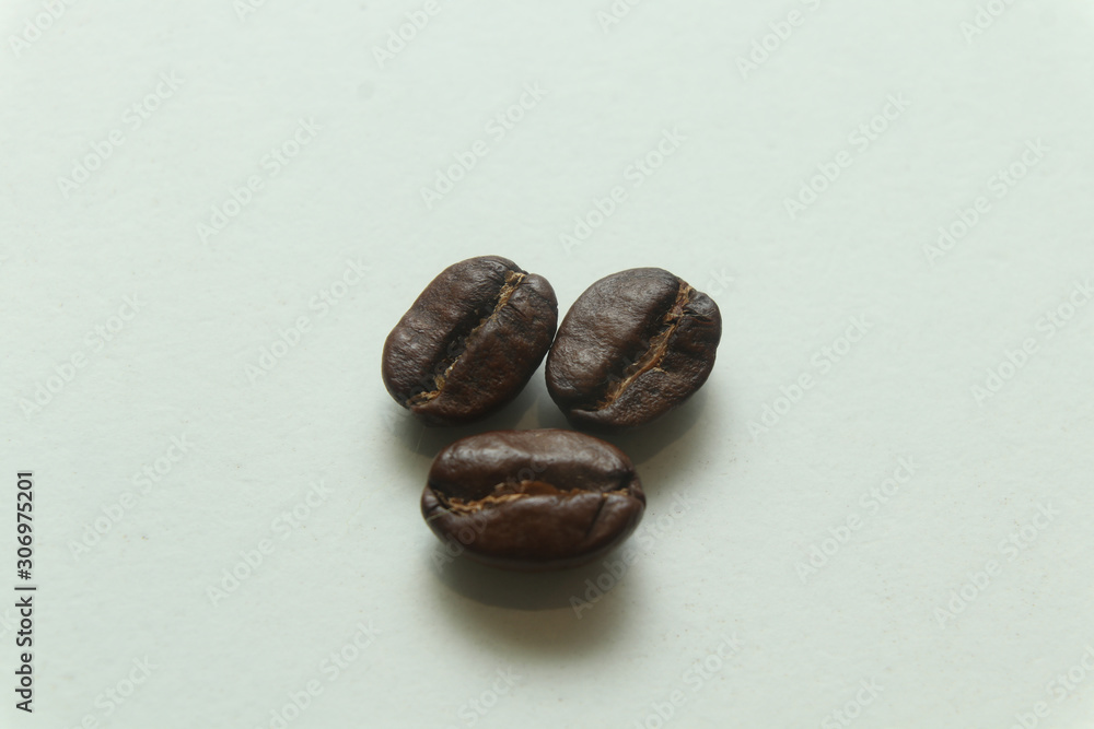 Coffee beans on macro shooting, closer view on a coffee beans. Coffee beans on macro shooting, closer view on a coffee beans.