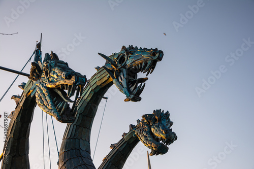 three-headed dragon against the sky