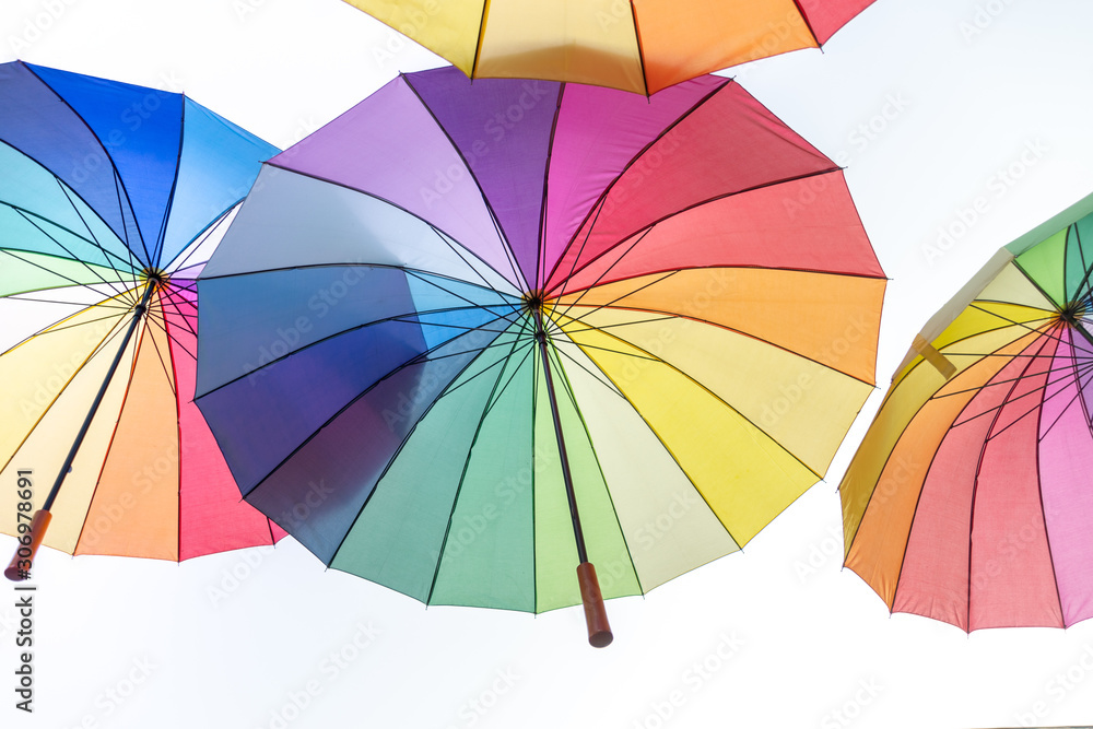 Rainbow coloured umbrellas - gay and lesbian symbol Rainbow coloured umbrellas - gay and lesbian symbol