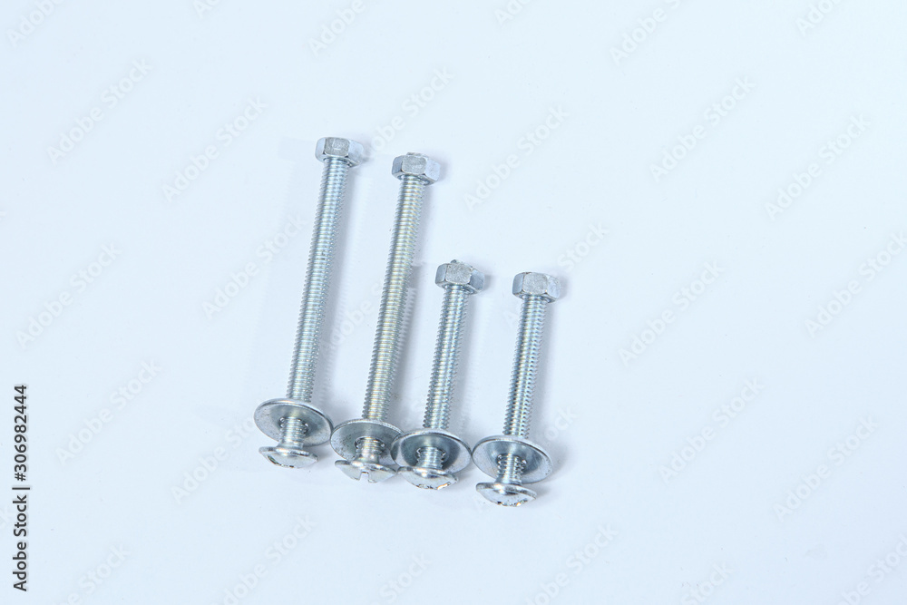 Chrome mounting bolts on a white background