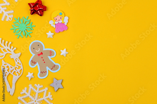 Christmas ornament on yellow background.