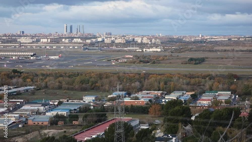 HD Time lapse about planes taking off at the airport Adolfo Suarez Madrid Barajas overlooking the city skyline and the 